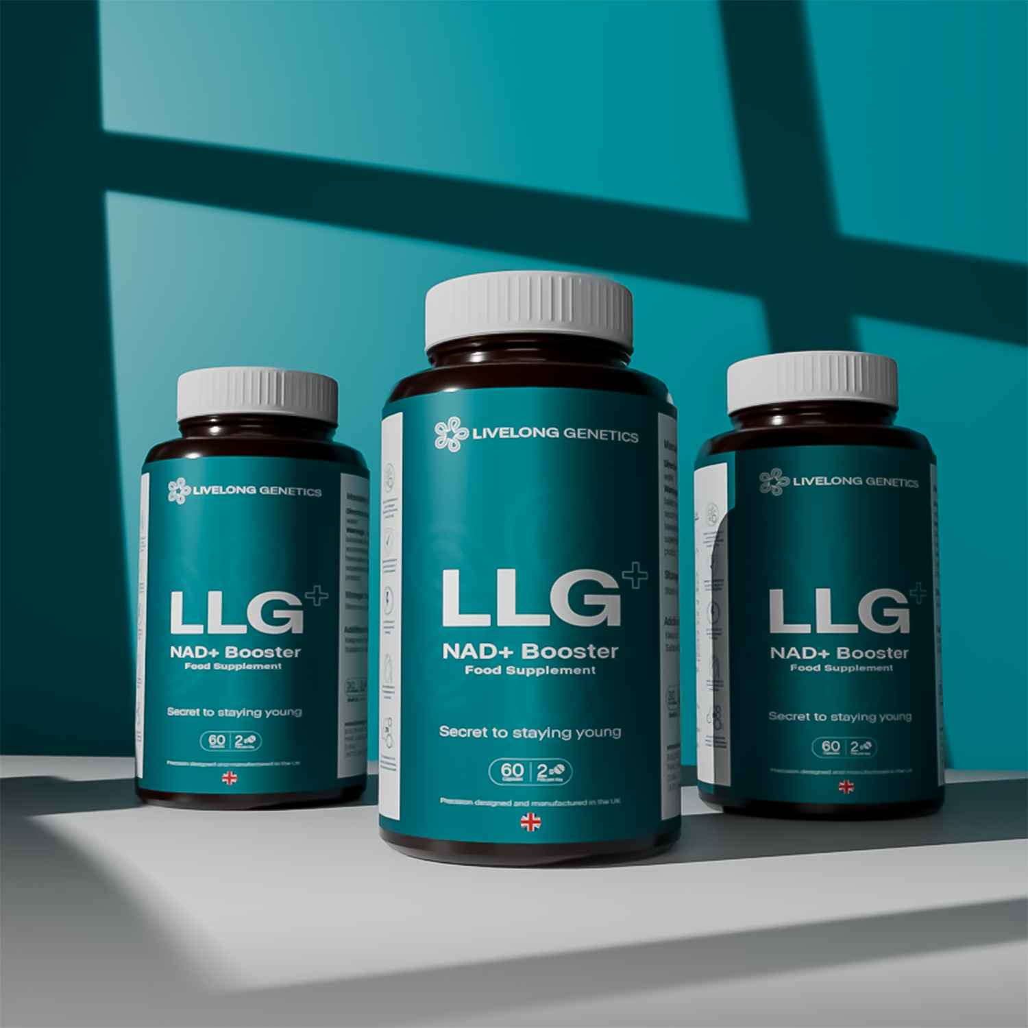 Three bottles of LLG NAD+ Booster All in One supplement on a light surface with a teal background